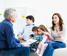 parents at a counsellor with their kids