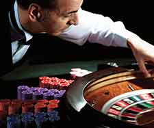 Male_placingnballonroulettewheel_casino