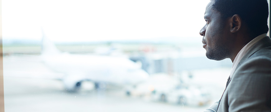 Man looking out a window