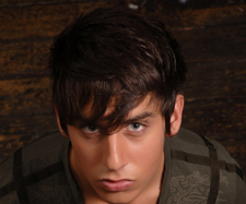 serious male teenager staring at camera