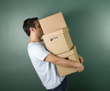 man moving boxes